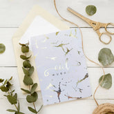 Pale blue Wenskaart Eid Mubarak met zilverfolie en decoratieve ontwerpen